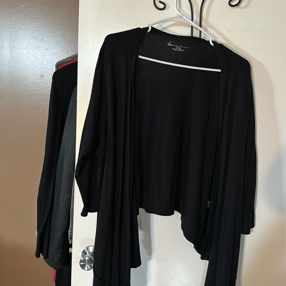 Black shrug with 3/4 sleeve.